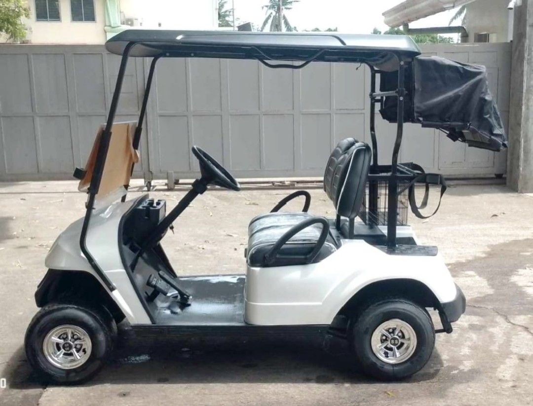 2 Seater Electric Golf Cart (Category: Golf) located in Cavite. Submitted by cebcar (Listing ID 1319422628, Image 3). Description: Promo Original price PHP285,000 New Paint New Tires New Upholstery Powered by GoSolar Lithium Battery New Windshield Free: Golf Bag Canopy 3 Months Warranty for Parts and Labor.
