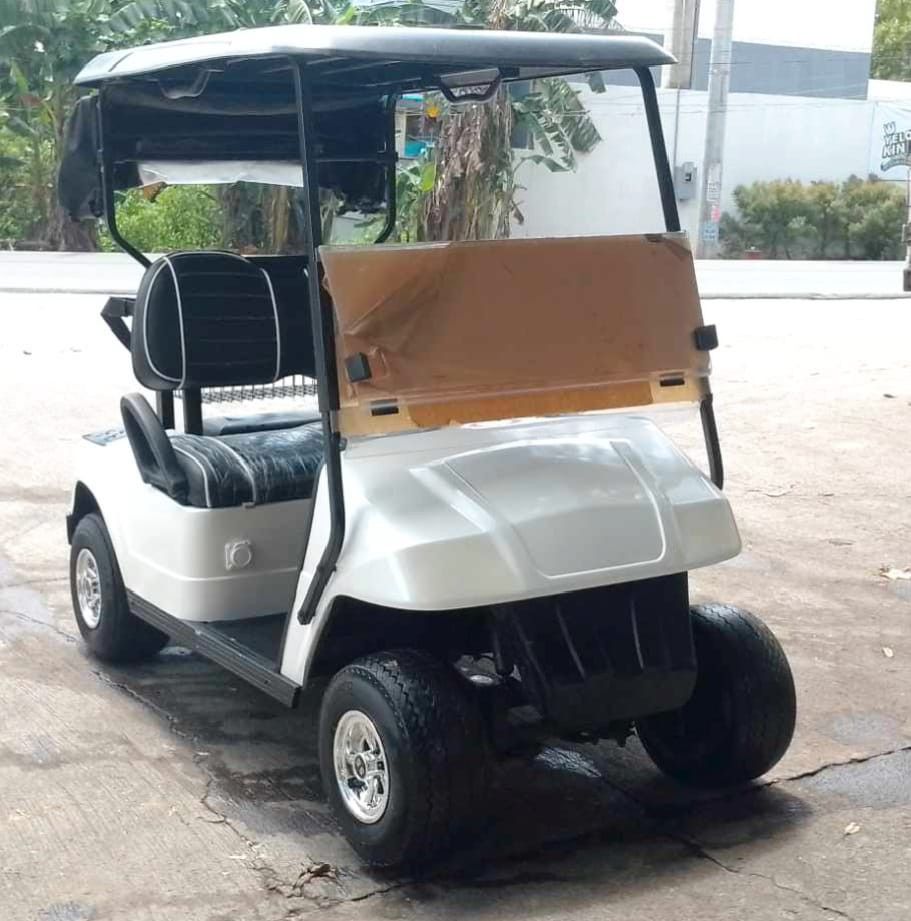 2 Seater Electric Golf Cart (Category: Golf) located in Cavite. Submitted by cebcar (Listing ID 1319422628, Image 2). Description: Promo Original price PHP285,000 New Paint New Tires New Upholstery Powered by GoSolar Lithium Battery New Windshield Free: Golf Bag Canopy 3 Months Warranty for Parts and Labor.