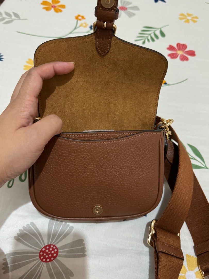 Coach mini amelia saddle bag (Category: Luxury Bags & Wallets) located in Orani. Submitted by xtine_rose (Listing ID 1319341318, Image 2). Description: Mini size Cannot fit promax phones.