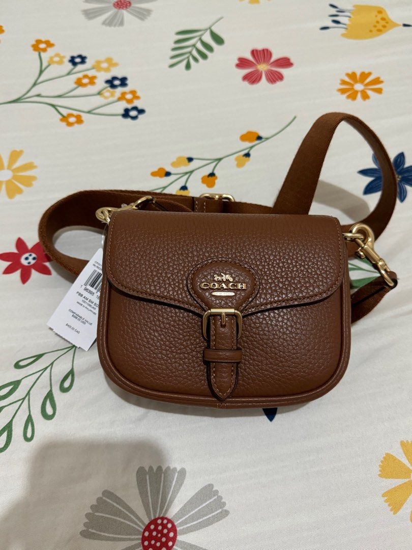 Coach mini amelia saddle bag (Category: Luxury Bags & Wallets) located in Orani. Submitted by xtine_rose (Listing ID 1319341318, Image 1). Description: Mini size Cannot fit promax phones.