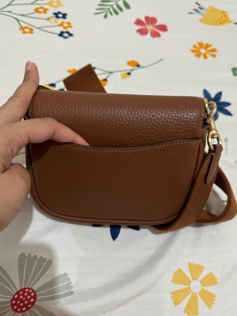 Coach mini amelia saddle bag (Category: Luxury Bags & Wallets) located in Orani. Submitted by xtine_rose (Listing ID 1319341318, Image 3). Description: Mini size Cannot fit promax phones.