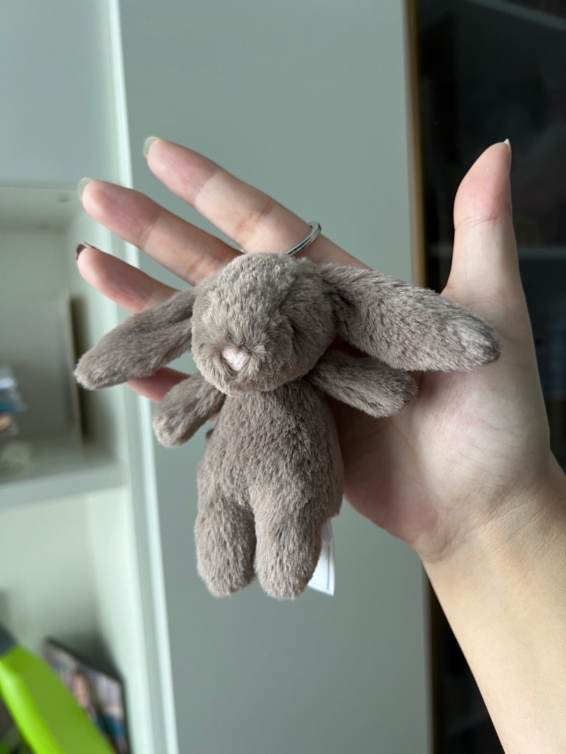 Jellycat Bashful Bunny Truffle bag charm in transit Women s Fashion Watches Accessories Other Accessories on Carousell