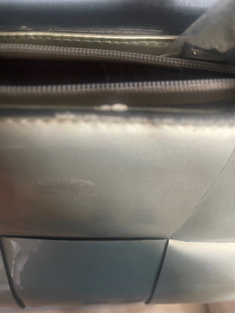 Large Shoulder Bag (Category: Cross-body Bags) located in Quezon City. Submitted by geuse (Listing ID 1319354996, Image 3). Description: Silver thick material 2-way bag Large size Sturdy, stand alone, with compartments With flaw on last pic Only 540 Loc. Tandang Sora, QC Gcash payment Delivery thru Lalamove or J&T.
