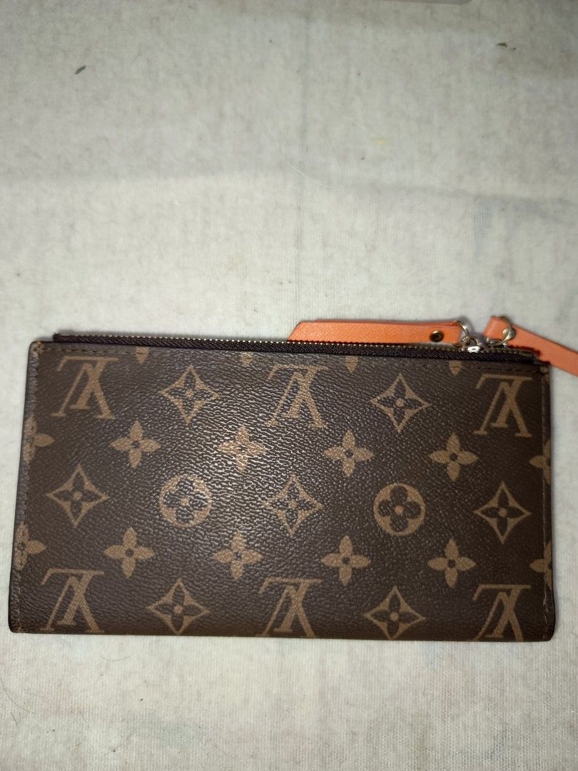 LV Bi fold Wallet (Category: Luxury Bags & Wallets) located in Davao. Submitted by ourvintagelife (Listing ID 1319351619, Image 1). Description: price for 2 wallets already. gift lang sa akin 2 christmas ago..