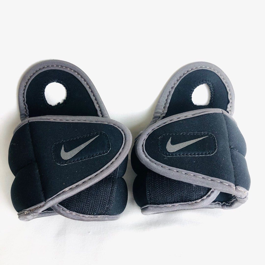 NIKE Dri Fit 1lb. Workout Wrist Weights (Category: Weights & Dumbbells) located in Tagaytay City. Submitted by barenwolf (Listing ID 1319354738, Image 3). Description: The Nike® 1lb Wrist Weights will help keep your skin cool and dry so you can focus on boosting your workout performance. The Nike® 1 lb Wrist Weights adjust to several user sizes with the adjustable strap and stays secure while in use with the hook and loop closure. Wrist weights T