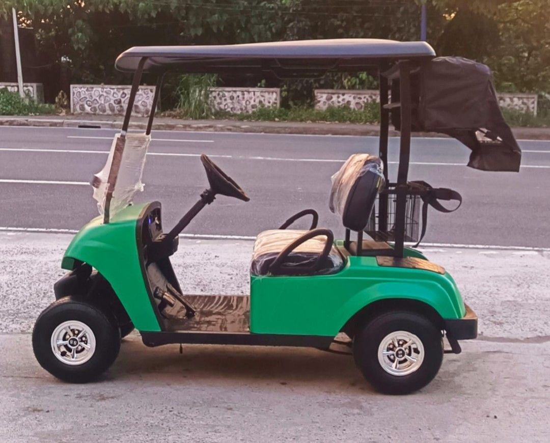 2 Seater Electric Golf Cart (Category: Golf) located in Cavite. Submitted by cebcar (Listing ID 1312009819, Image 2). Description: Promo unit! Powered by GoSolar Lithium Battery New Paint Body and Chassis New Upholstery New Foldable Windshield Freebies - golf bag canopy 3 months Warranty Labor and Parts.