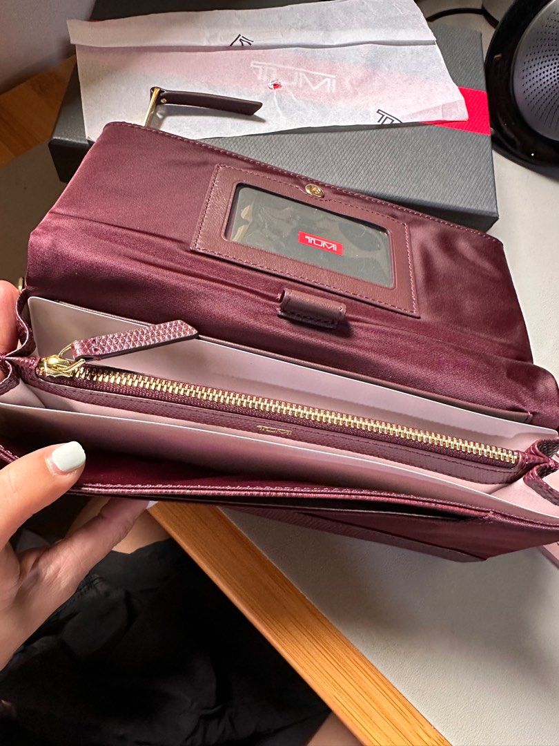 Tumi clutch wallet discount