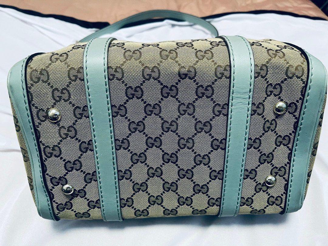 Gucci shoulder bag Authentic (Category: Bags & Wallets) located in Singapore. Submitted by messystore777 (Listing ID 1319616577, Image 3). Description: 💯 Authentic Gucci Boston Very new bag wear a few time and keep clean Limited editions color bag You can check before buy it Can put a lot things together ( wallets umbrella, water bottle….) Come with full set ( paper Gucci bag, dusty bag ) same pictures.