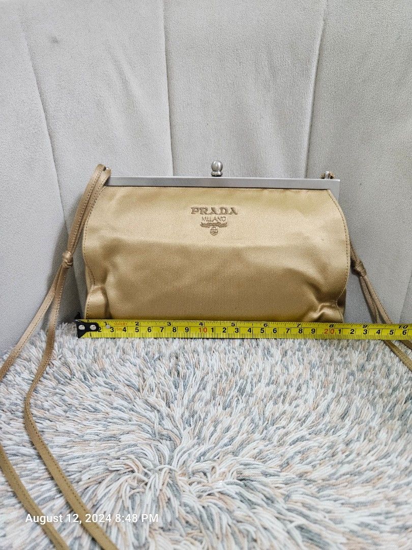 Prada Raso Marchio satin bag original (Category: Luxury Bags & Wallets) located in San Juan City. Submitted by rmdeclutter (Listing ID 1319643771, Image 3). Description: Original Don't need anymore.