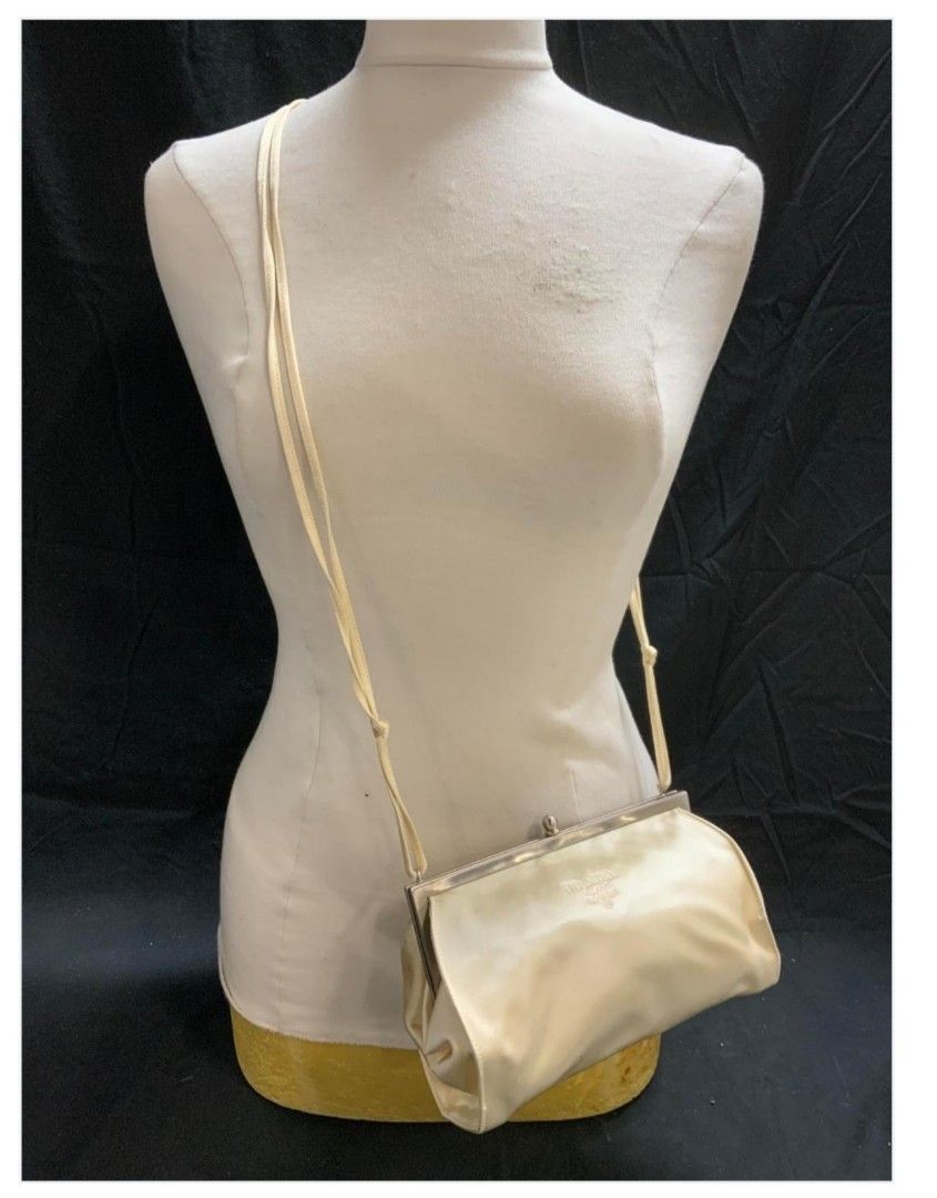 Prada Raso Marchio satin bag original (Category: Luxury Bags & Wallets) located in San Juan City. Submitted by rmdeclutter (Listing ID 1319643771, Image 1). Description: Original Don't need anymore.