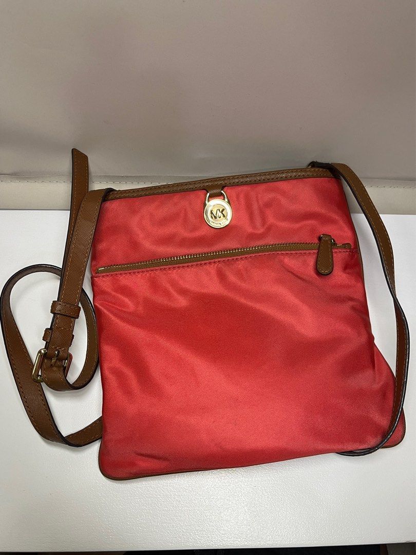Authentic Michael Kors Cross Body Bag (Category: Luxury Bags & Wallets) located in Quezon City. Submitted by ukayana.studio (Listing ID 1319803358, Image 1). Description: - still in great quality! no flaws! - 9.5 x 9.5 inches - strap is adjustable but not removable - can send more pics upon request - rfs: don't use it anymore - location: quezon city.