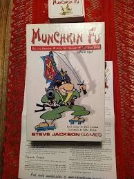 Munchkin fu card/board games (Category: Board Games & Puzzles) located in Quezon City. Submitted by whizdepot (Listing ID 1319758088, Image 2). Description: Part of the Munchkin series. Munchkin is a satirical card game based on the clichés and oddities of Dungeons and Dragons and other role-playing games. Each player starts at level 1 and the winner is the first player to reach level 10. Players can acquire familiar D&D style character classes d