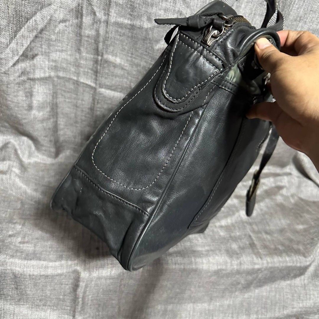 Tough Jeansmith Document bag (Category: Luxury Bags & Wallets) located in Manila. Submitted by greyinfash06839 (Listing ID 1319867218, Image 3). Description: 🤍Price: 2,999 pesos only 🤍Item: Tough Jeansmith Document bag 🤍Brand: Tough Jeansmith 🤍Matirial: Leather 🤍Quality: Original 🤍color: Black 🤍Size: Large 🤍Dimension. H: 11 L: 16 W: 6 🤍Sex: For men 🤍Issue: No sling 🤍Condition Rate: 8/10 🤍Other info:.