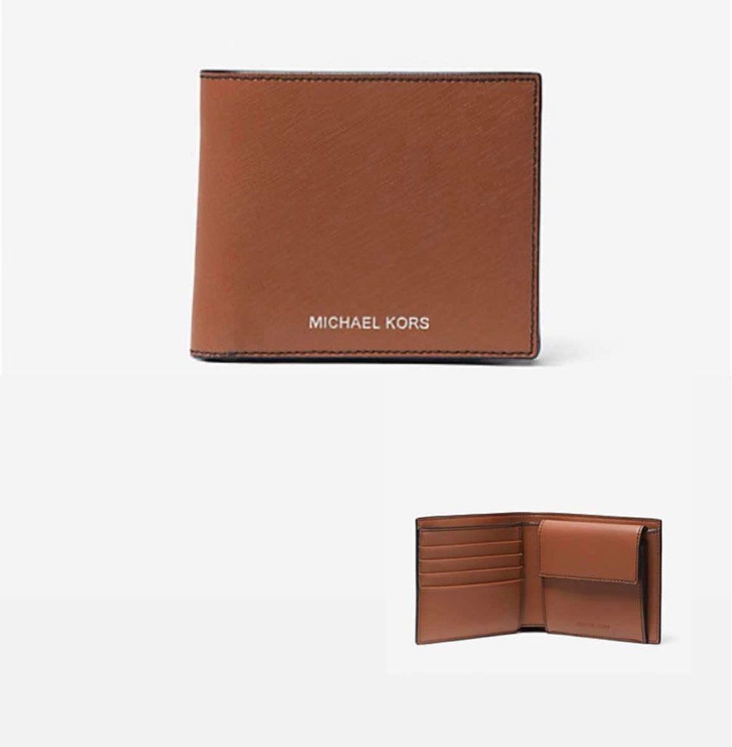 Authentic Michael Kors leather billfold wallet 🇺🇸 (Category: Wallets & Card holders) located in Cavite. Submitted by fordeclutter (Listing ID 1320048000, Image 1). Description: Authentic MK wallet bought here in California Brand new, sobra sa nabili. Color: luggage • 100% leather • 4.33”W X 3.66”H X 1”D • Interior details: 4 card slots, coin pouch, bill compartment • Lining: 100% polyester.