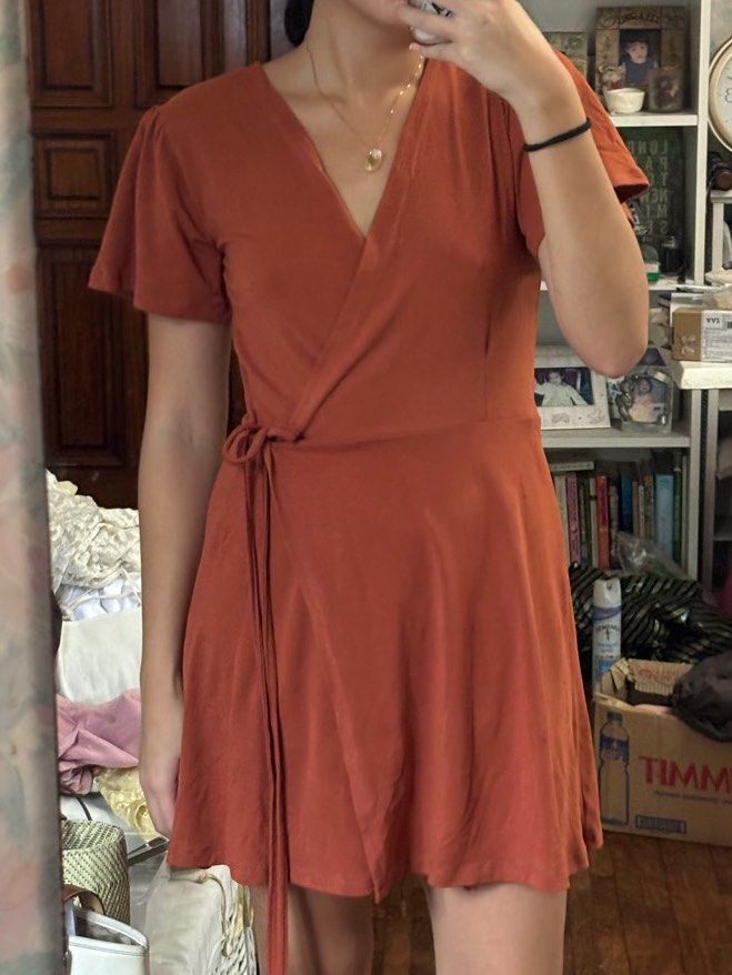 burnt orange rust wrap mini dress (Category: Dresses) located in Quezon City. Submitted by prebym (Listing ID 1319810519, Image 2). Description: loved this dress!! has really soft fabric and is breathable and stretchy. super comfortable unbranded my measurements: 32” bust. 27” waist. standard size small helping tags: araw halohalo miu the label phia the label cariño gvn renegade folk solasta suki blackbough sew local eighth mermaid traingl.