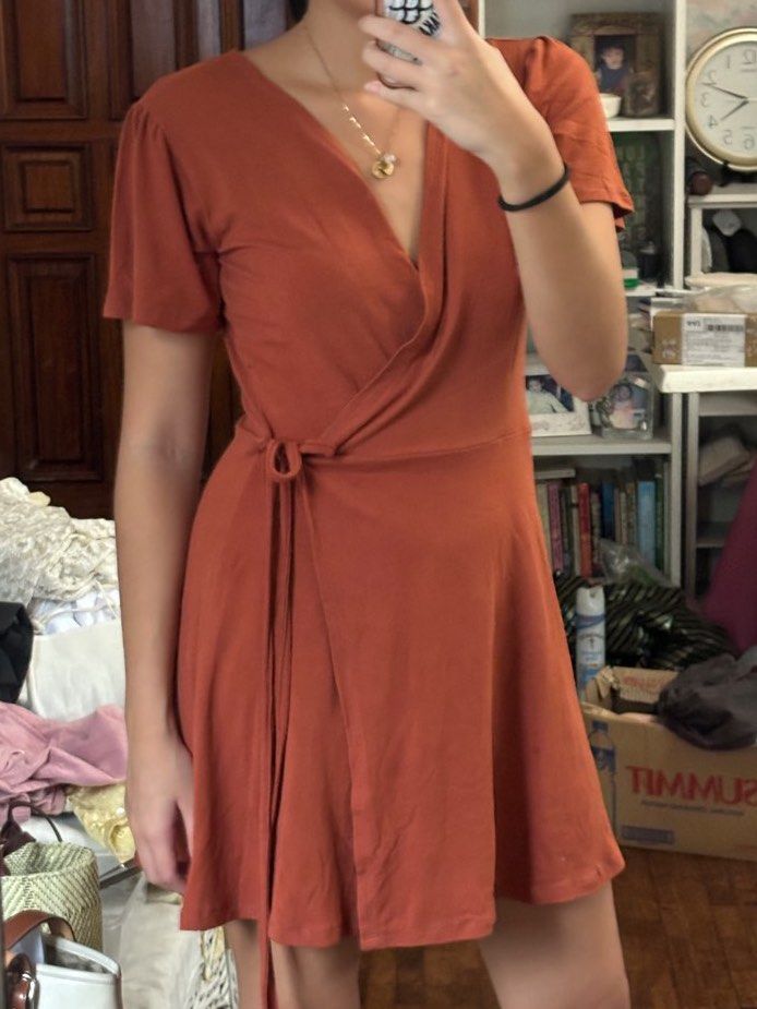 burnt orange rust wrap mini dress (Category: Dresses) located in Quezon City. Submitted by prebym (Listing ID 1319810519, Image 3). Description: loved this dress!! has really soft fabric and is breathable and stretchy. super comfortable unbranded my measurements: 32” bust. 27” waist. standard size small helping tags: araw halohalo miu the label phia the label cariño gvn renegade folk solasta suki blackbough sew local eighth mermaid traingl.
