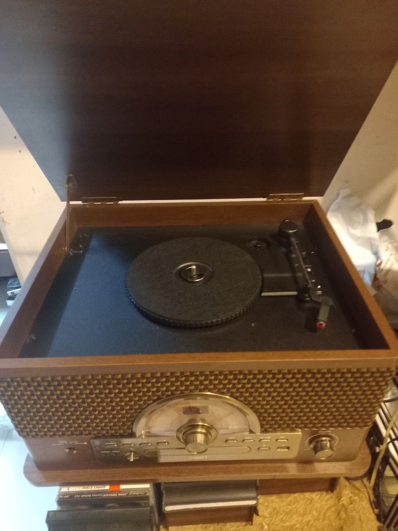 ION SUPERIOR TURNTABLE (Category: Portable Music Players) located in Manila. Submitted by richardlee51903 (Listing ID 1319914982, Image 2). Description: ion superior turntable lahat umaandar namn..radio cd cassette turntable USB at Bluetooth. issue isang knobs nawala at kahoy lng may tapas kunti..