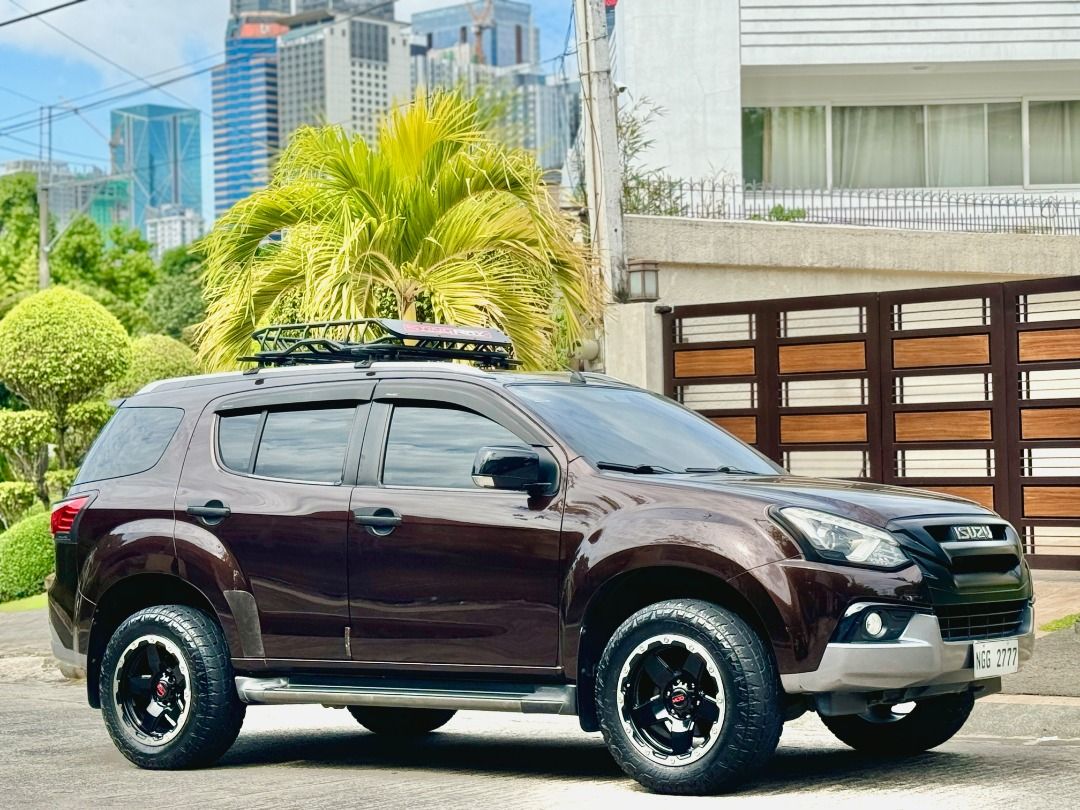Isuzu Mu-X RZAE 1.9L Turbo Diesel Auto (Category: Used Cars) located in Caloocan City. Submitted by geloud (Listing ID 1223453453, Image 2). Description: 2020 Acquired / Released Isuzu Mu-X RZAE - Blue Power 1.9L Diesel Engine 4x2 Push to Start Automatic Transmission Ice Cold AC Fresh In and Out 9” Android Head Unit Second Row Ceiling Monitor Wireless Charging Phone Mount 8pax Capacity Leather Seats Foldable Third Row Heavy Duty Roof Rack System 