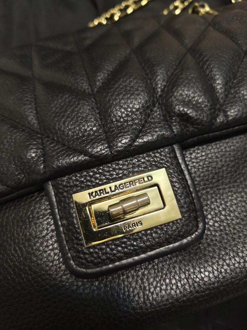 KARL LAGERFELD (Category: Luxury Bags & Wallets) located in Pasig City. Submitted by calybrown (Listing ID 1319962870, Image 3). Description: karl lagerfeld black in gold hardware slight hairline scratches on hardwares with dustbag.