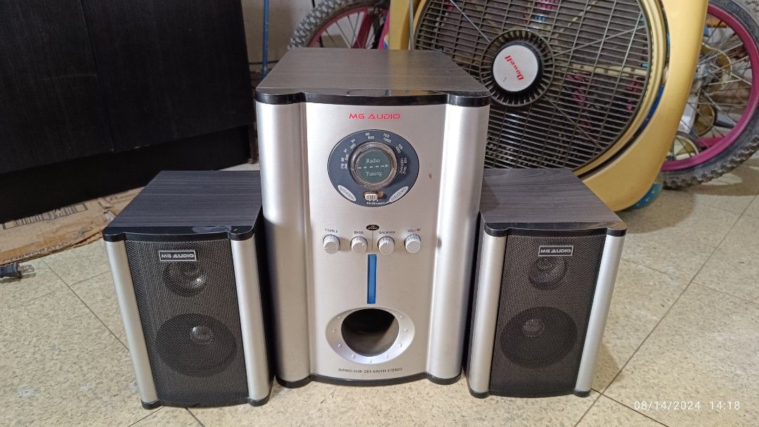 MG Audio (defective) (Category: Soundbars, Speakers & Amplifiers) located in Pasig City. Submitted by richard.dg (Listing ID 1319972396, Image 1). Description: Maganda at malakas tumunog via Aux-in (ok na PC speakers) kaso yung tuner niya at volume knobs medyo di kumakagat minsan. Needs repair As is, where is.