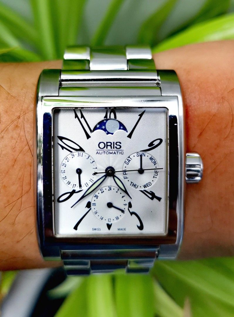 Oris Rectangular Moonphase Complication 34MM Automatic GMT Rare 💯%Authentic (Category: Luxury Watches) located in Mandaluyong City. Submitted by nwatch.ph (Listing ID 1319889784, Image 2). Description: Very Good Condition Size 34MM X 45MM 9/10 Rating Moonphase Complication Automatic GMT Dual Time Sapphire Crystal Watch Only & Authenticity Card Swiss Made 💯%Authentic or Money Back Thanks Admin🙏🙏🙏❤️❤️❤️.