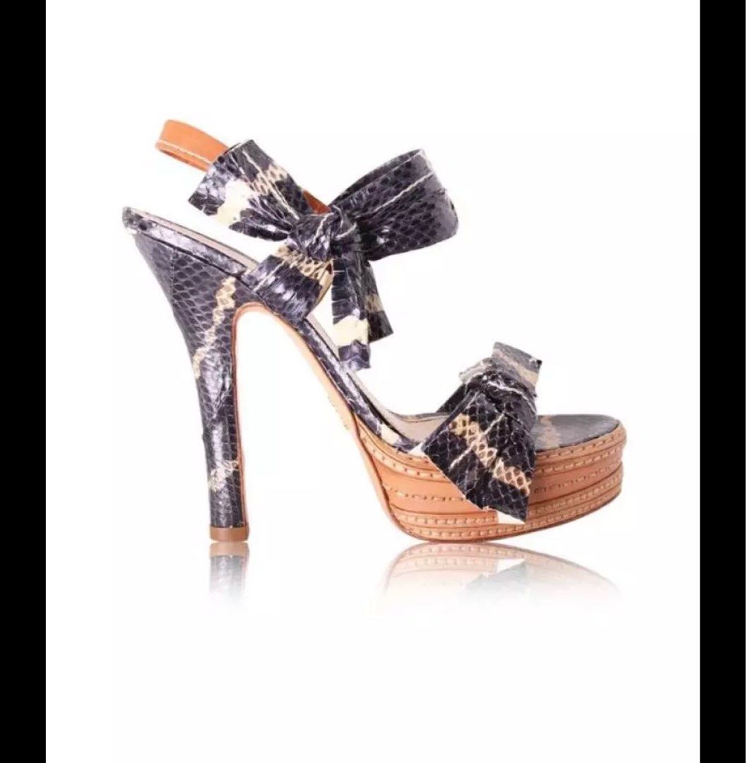 Prada python heels sandals (Category: Heels) located in Singapore. Submitted by laura2202 (Listing ID 1319962131, Image 1). Description: .