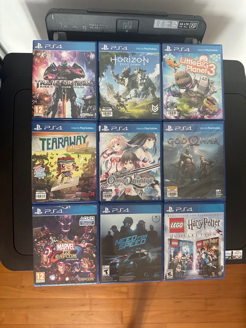 PS4 game Transformers Horizon zero dawn Little big planet 3 Tearaway Omega Quintet God of war Marvel vs Capcom Need for speed Lego