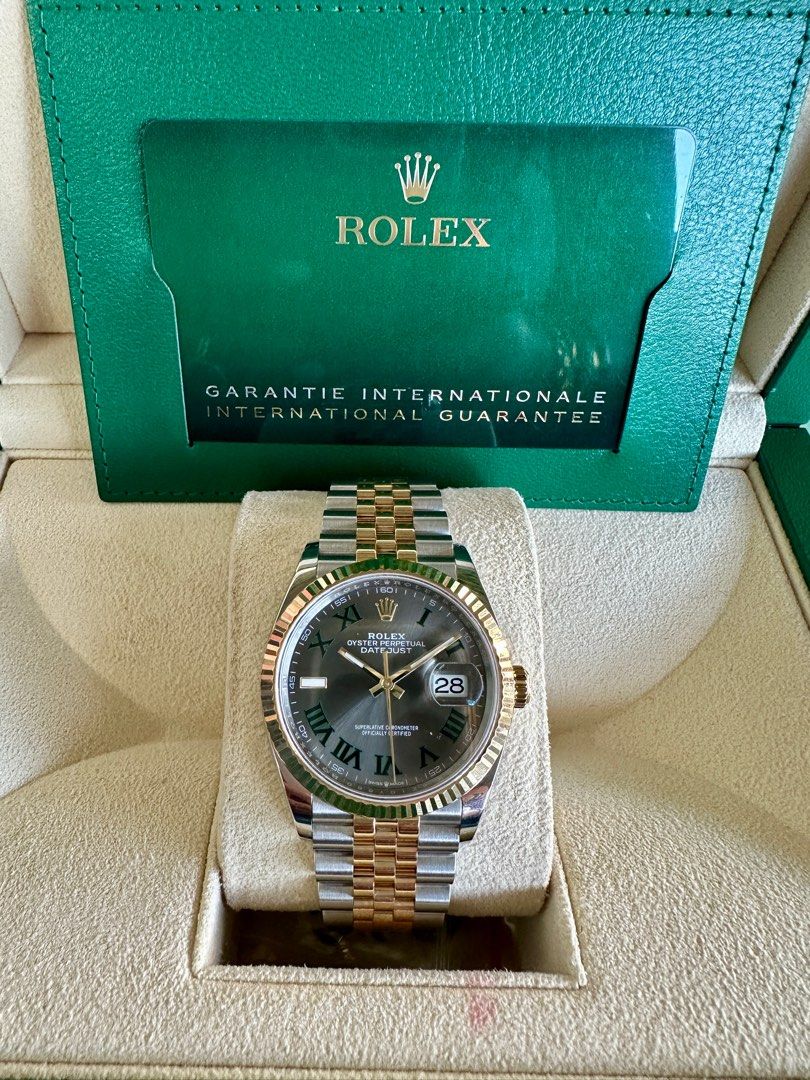Rolex Datejust 36mm Wimbledon Dial 2023 (Category: Luxury Watches) located in Davao. Submitted by rayneebel (Listing ID 1319964508, Image 1). Description: In excellent condition.. Comes with box & cards.. *stainless steel bracelet & matetial *36mm case size *Yellow gold bracelet dial Grey dial with Roman hour markers (Wimbledon dial) .