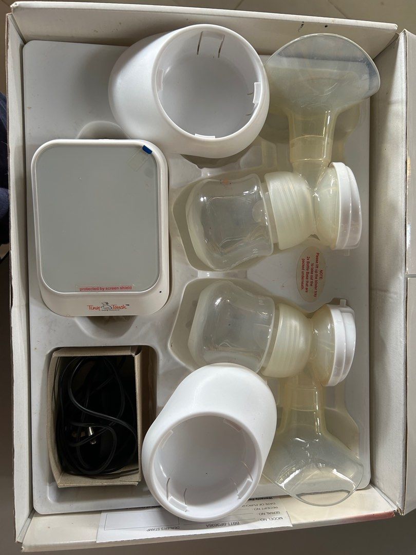 Tiny touch (Category: Breastfeeding & Bottle Feeding) located in Bandar Pusat Jengka. Submitted by geroboksara_ (Listing ID 1319932676, Image 1). Description: Tiny touch breast pump for sale, condition mcm dalam gambar. Suction semua okay. .