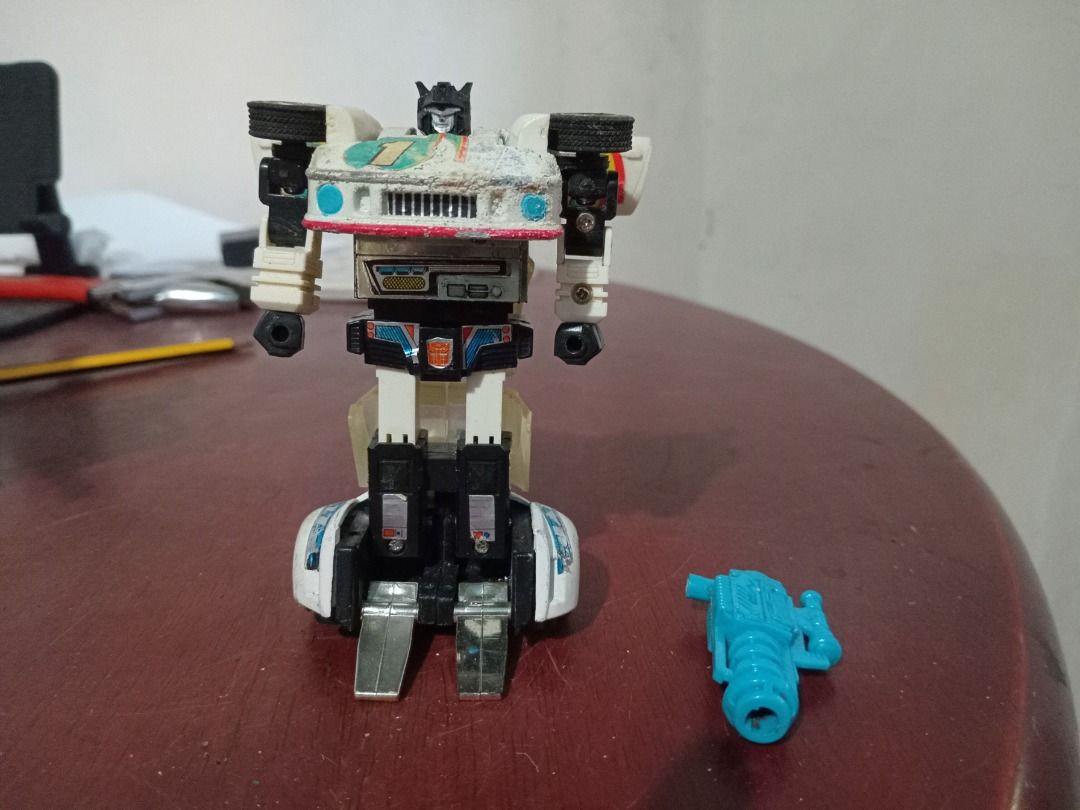 Transformers Autobot Jazz (Category: Action & Battle Toys) located in Las Pinas. Submitted by dhon162x02905 (Listing ID 1319979151, Image 1). Description: The gun handle is broken no missile and front bumper is damaged. No box. 1 Stock Available..