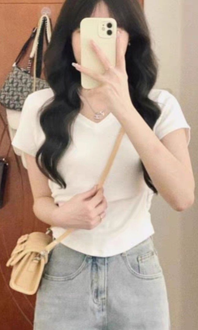 White top (Category: Shirts) located in Singapore. Submitted by kwntt (Listing ID 1319905740, Image 3). Description: shoulder 38cm bust 34cm length w 42cm.