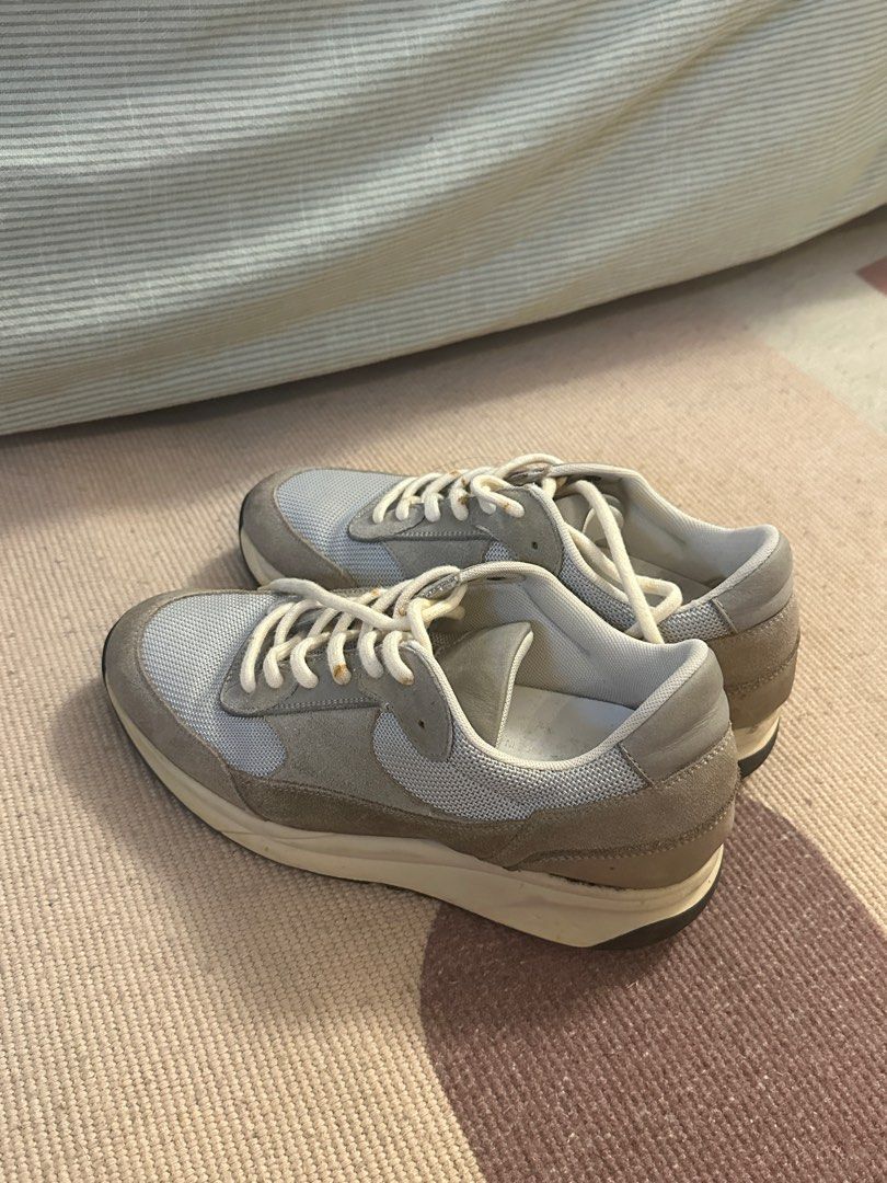 Woman by Common Projects Retro 80 in Tan (Category: Sneakers) located in San Juan City. Submitted by lildepop (Listing ID 1320029449, Image 2). Description: Size: 37 on tag fits 7-7.5 Women Condition: Excellent Material: Suede, Manmade rubber, Polyester Silhouette: Casual, Minimalism, Acne Studios Inspired by New Balance 574, this cushioned Italian sneaker features familiar suede and mesh panels. A future classic, the midsole is reminiscent of vi