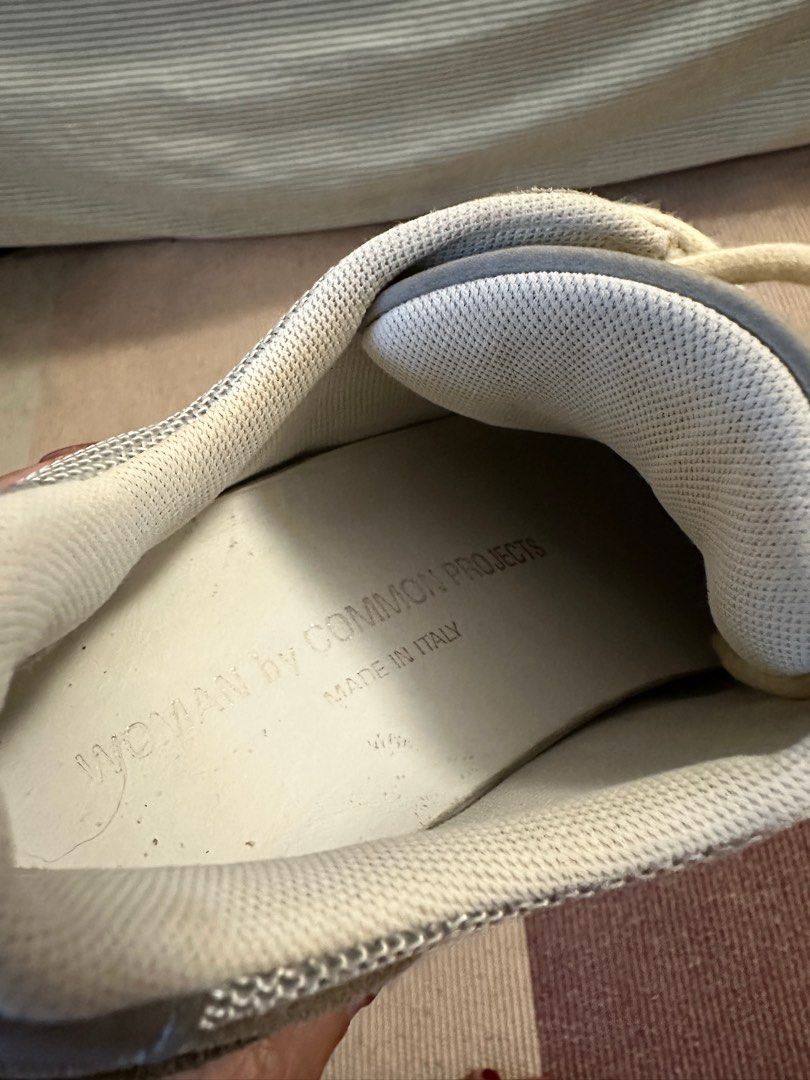 Woman by Common Projects Retro 80 in Tan (Category: Sneakers) located in San Juan City. Submitted by lildepop (Listing ID 1320029449, Image 3). Description: Size: 37 on tag fits 7-7.5 Women Condition: Excellent Material: Suede, Manmade rubber, Polyester Silhouette: Casual, Minimalism, Acne Studios Inspired by New Balance 574, this cushioned Italian sneaker features familiar suede and mesh panels. A future classic, the midsole is reminiscent of vi