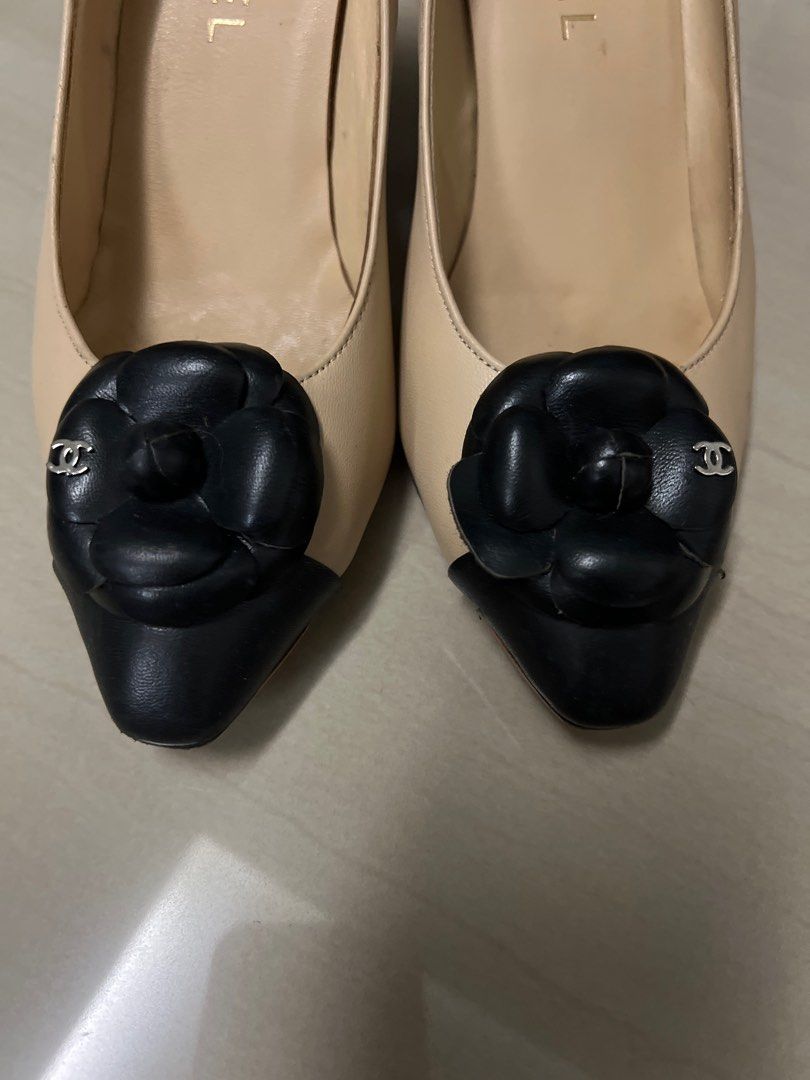 Chanel nude heels with black tips camellia logo
