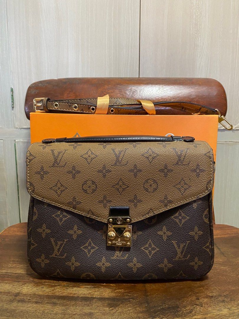 LV Hand bag with sling (Category: Luxury Bags & Wallets) located in Agoo. Submitted by geli_closet (Listing ID 1320149985, Image 1). Description: • Once used only 🏠 Loc: Agoo, La Union 💰Payment first via Gc**h 📦 For shipping outside La Union via Regular SF (J&T).