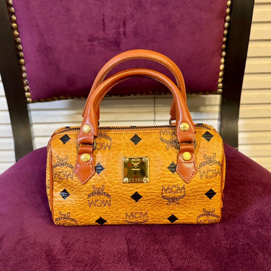 MCM Cognac Visetos Mini Boston Bag Coated Canvas (Category: Luxury Bags & Wallets) located in San Juan City. Submitted by jwipshcart (Listing ID 1320202805, Image 1). Description: Really good condition MOP - GCash MOD - SDD Loc - Metro Manila.