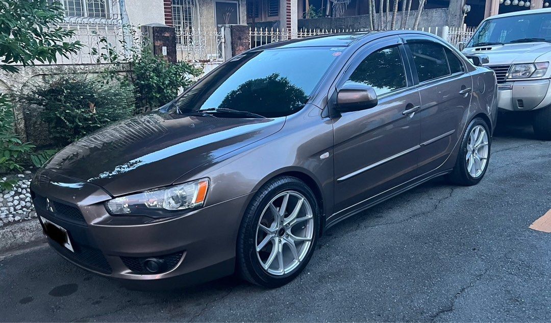 Mitsubishi Lancer 1.6 EX Auto (Category: Used Cars) located in Paranaque City. Submitted by benjiebenz29514 (Listing ID 1320166580, Image 2). Description: For sale! 2014 mitsubishi lancer ex mx Automatic Rare color mocha bronze Android headunit 18” mags Acquired from 1st owner Updated registration until feb. 2025 130+++k original mileage No issues Properly maintained car See to appreciate 375k.