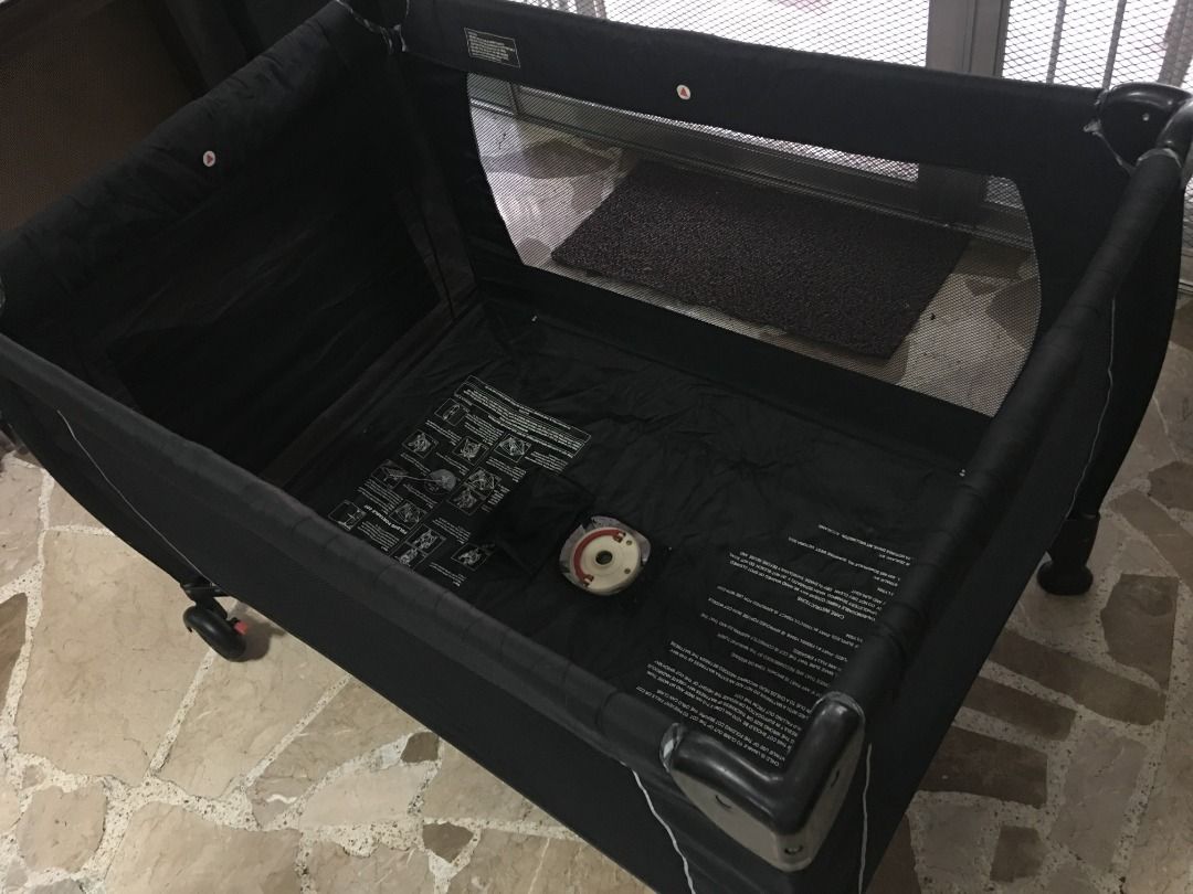 Mother's Choice Crib (Category: Cots & Cribs) located in San Juan City. Submitted by dquad.dquad (Listing ID 1320165365, Image 2). Description: Mother's Choice Portable Crib Color: Black with checkered lining Measurement in inches (L x W x H): 44" x 30" x 29" Foldable With Lockable Wheels With padded folding mattress With Carry Bag Like New - used less than 10x. Location: Scout Area. Bgy Roxas Quezon City.