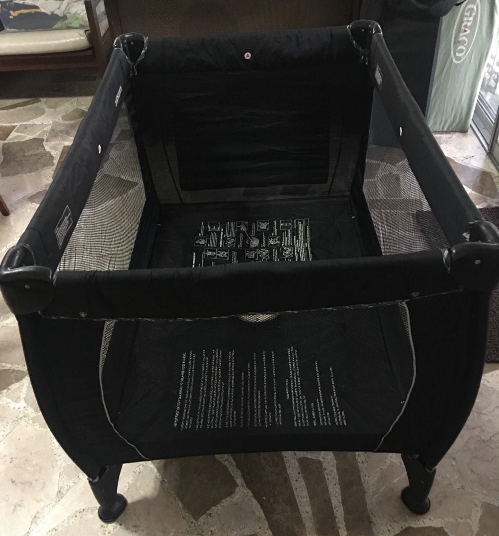 Mother's Choice Crib (Category: Cots & Cribs) located in San Juan City. Submitted by dquad.dquad (Listing ID 1320165365, Image 3). Description: Mother's Choice Portable Crib Color: Black with checkered lining Measurement in inches (L x W x H): 44" x 30" x 29" Foldable With Lockable Wheels With padded folding mattress With Carry Bag Like New - used less than 10x. Location: Scout Area. Bgy Roxas Quezon City.