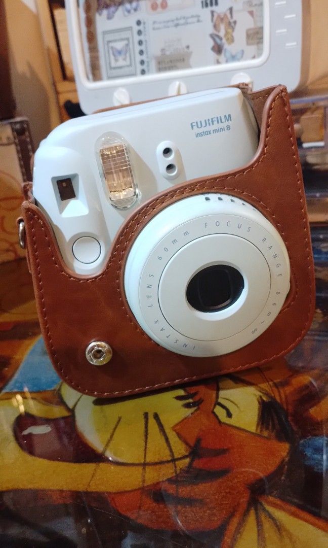 Pre-loved Instax Mini 8 with Case & Batteries (Category: Cameras) located in Quezon City. Submitted by jenchipotle (Listing ID 1320146195, Image 1). Description: I am selling my pre-loved Instax Mini 8 for only 2000php. Comes in a hard case, includes batteries. Issue: Thin crack on the side (pls see last photo) but other than that, perfectly working Please be reminded not to use ordinary batteries, this requires alkaline LR6 ones..