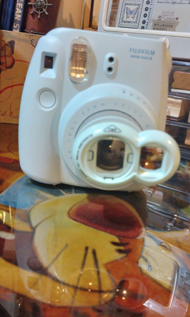 Pre-loved Instax Mini 8 with Case & Batteries (Category: Cameras) located in Quezon City. Submitted by jenchipotle (Listing ID 1320146195, Image 3). Description: I am selling my pre-loved Instax Mini 8 for only 2000php. Comes in a hard case, includes batteries. Issue: Thin crack on the side (pls see last photo) but other than that, perfectly working Please be reminded not to use ordinary batteries, this requires alkaline LR6 ones..