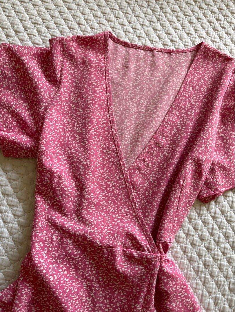 SHEIN Pink Floral Wrap Dress (Category: Dresses) located in Manila. Submitted by bubble.s (Listing ID 1320164585, Image 2). Description: 〰️ used 3-5 times only 〰️ loved this, super cute and girly 〰️ negotiable 〰️ SF shouldered by the buyer RFS: don't reach for it anymore Message for more inquiries about sizing & when worn!.
