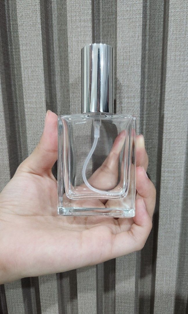 50 ml glass spray bottle for perfume (Category: Fragrance & Deodorants) located in Quezon City. Submitted by mikaela7850263 (Listing ID 1320353406, Image 1). Description: 50 ml glass spray bottle for perfume - with silver cap - never used - dimensions: 5.5 cm × 11.5 cm x 3 cm Wholesale price available for 15 or more pcs MOP: Gcash, online bank transfer MOD: Grab or Lalamove (shouldered by buyer).