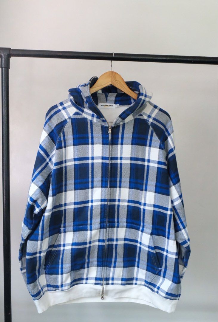Bape full zip plaid jacket (Category: Looking For) located in Cainta. Submitted by plus.eighty.one (Listing ID 1320269144, Image 1). Description: A bathing ape Full zip Hoodie Plaid Size xl Pit to pit 25 Length 29 Condition : 9/10 almost new, light dirt on white part Made in japan.