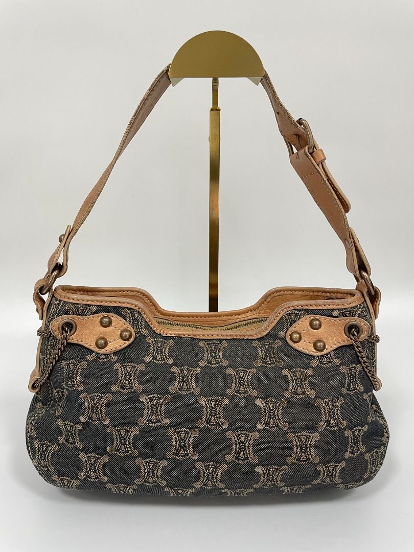 Celine Macadam Shoulder Bag in Denim (Category: Luxury Bags & Wallets) located in Taguig. Submitted by reggiesbaul (Listing ID 1320234297, Image 3). Description: This bag is crafted from sturdy Celine logo denim with an overall aged look. It features brass hardware and distressed leather trim. Condition The item is in good condition with little signs of wear on the trim. Features Product: Shoulder bag / hand bag Designer: Celine Color: Brown / Ta