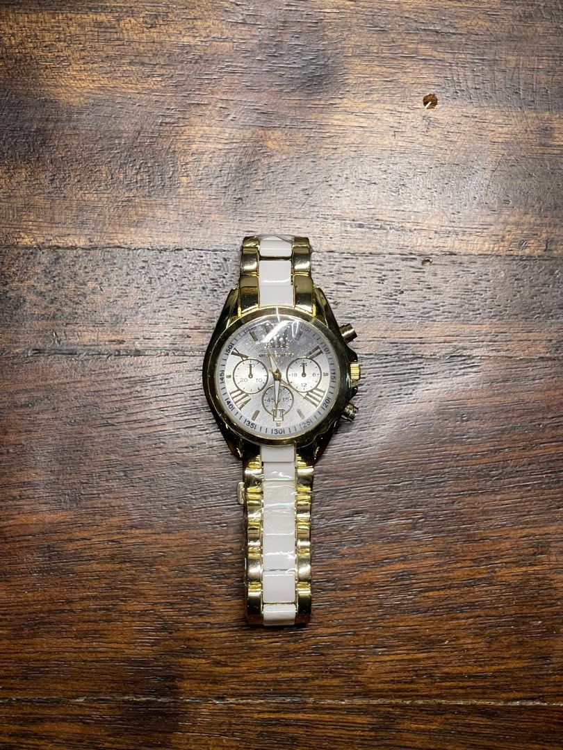 CLASS A Michael Kors MK5743 Watch (Category: Women's Watches) located in Pasig City. Submitted by iammivm (Listing ID 1320378963, Image 1). Description: CLASS A PRODUCT of MK5743 Bradshaw Chronograph White Dial Two-tone Ladies Watch Need to replace the battery Brand New Quartz (Battery) COLOR - Gold / White CASE SIZE - 43 mm CASE THICKNESS - 13 mm CASE MATERIAL - Stainless Steel CASE SHAPE - Round CASE BACK - Solid .