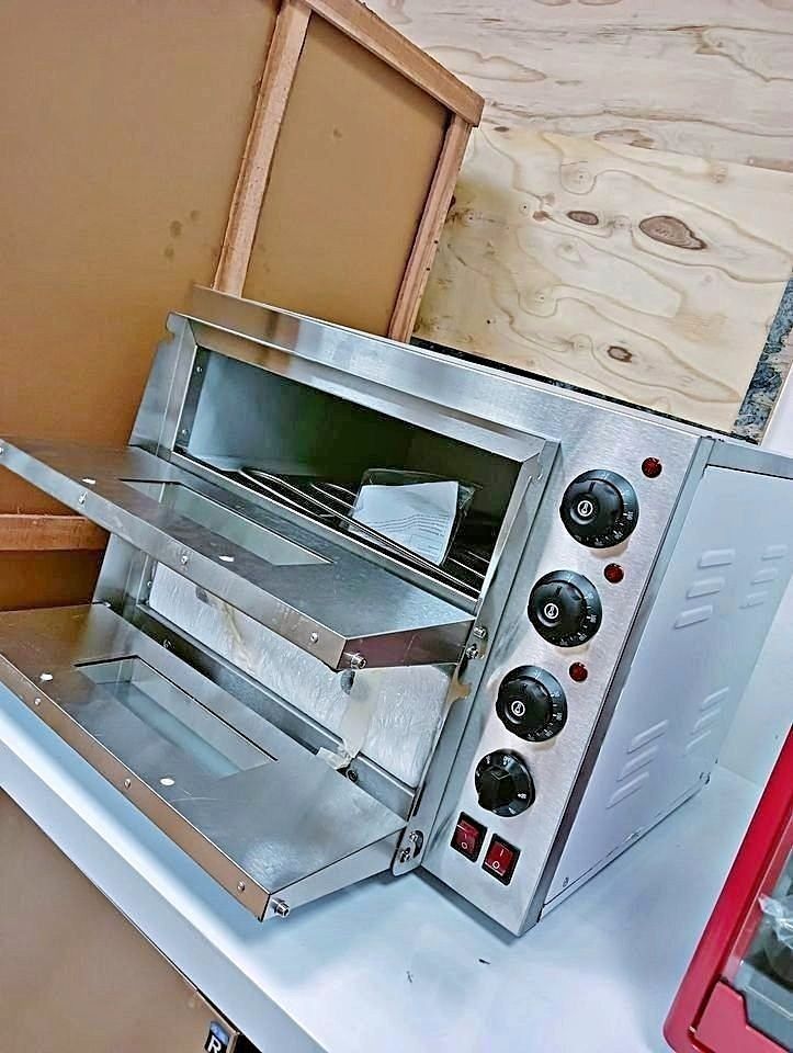 COMMERCIAL ELECTRIC DOUBLE DECK PIZZA OVEN WITH STONE (Category: Ovens & Toasters) located in Taguig. Submitted by mgracelim38484 (Listing ID 1320303636, Image 3). Description: SPECIFICAATION: 2 deck 2 trays electric oven Capacity: 220V, 50Hz/ 60Hz, 3000W Stainless steel electric oven Accessories: bake tray, bake rack Product Dimension (L x W x H) (cm) : 56x 56 x 44. OPEN FOR: VIA LALAMOVE DELIVERY. PICK UP IN SILANG CAVITE. Warranty period : 3 M