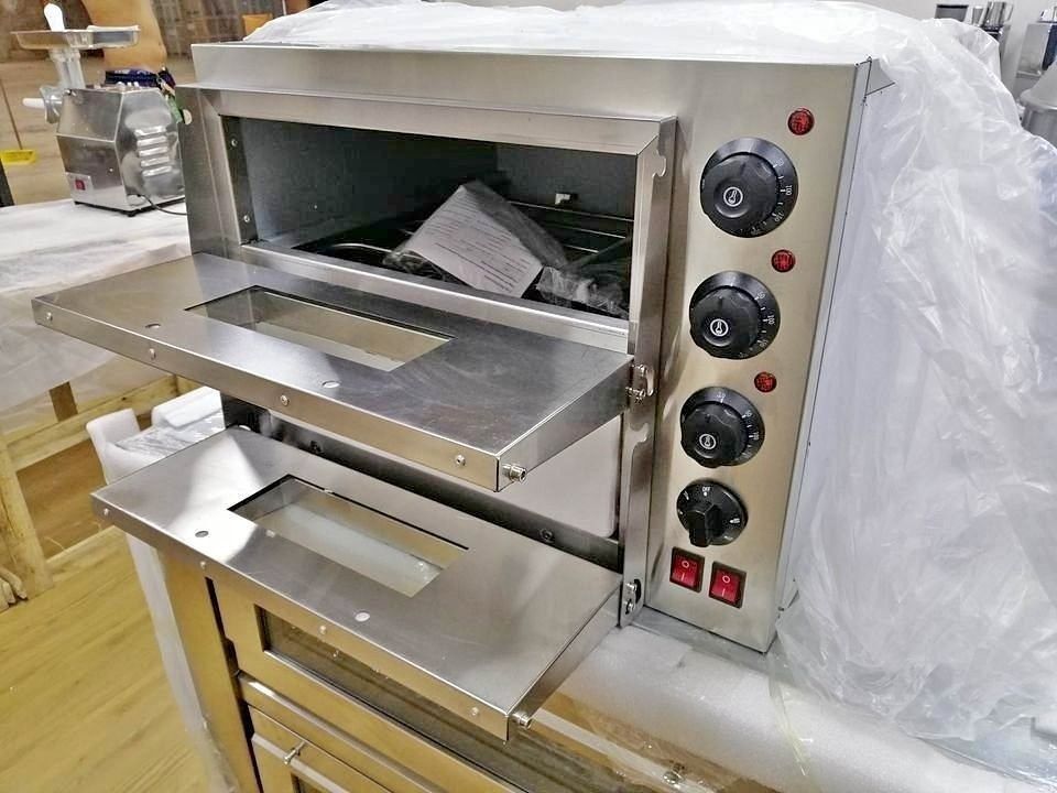COMMERCIAL ELECTRIC DOUBLE DECK PIZZA OVEN WITH STONE (Category: Ovens & Toasters) located in Taguig. Submitted by mgracelim38484 (Listing ID 1320303636, Image 2). Description: SPECIFICAATION: 2 deck 2 trays electric oven Capacity: 220V, 50Hz/ 60Hz, 3000W Stainless steel electric oven Accessories: bake tray, bake rack Product Dimension (L x W x H) (cm) : 56x 56 x 44. OPEN FOR: VIA LALAMOVE DELIVERY. PICK UP IN SILANG CAVITE. Warranty period : 3 M