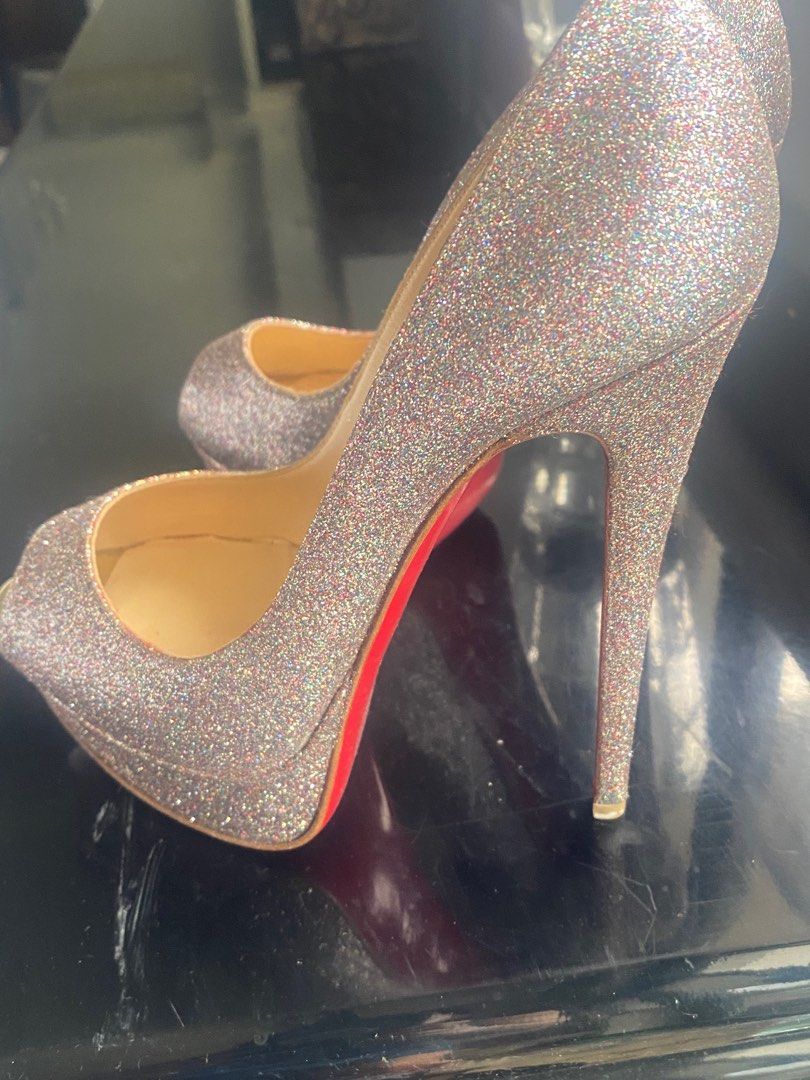 Hardly used authentic sparkly Christian Louboutin (Category: Heels) located in Makati City. Submitted by bijouxdesigner (Listing ID 1320257113, Image 3). Description: Never been used.. original sparkly Christian Louboutin high heel 4-5 inches in height . Size 6.