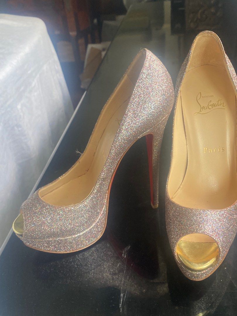 Hardly used authentic sparkly Christian Louboutin (Category: Heels) located in Makati City. Submitted by bijouxdesigner (Listing ID 1320257113, Image 2). Description: Never been used.. original sparkly Christian Louboutin high heel 4-5 inches in height . Size 6.